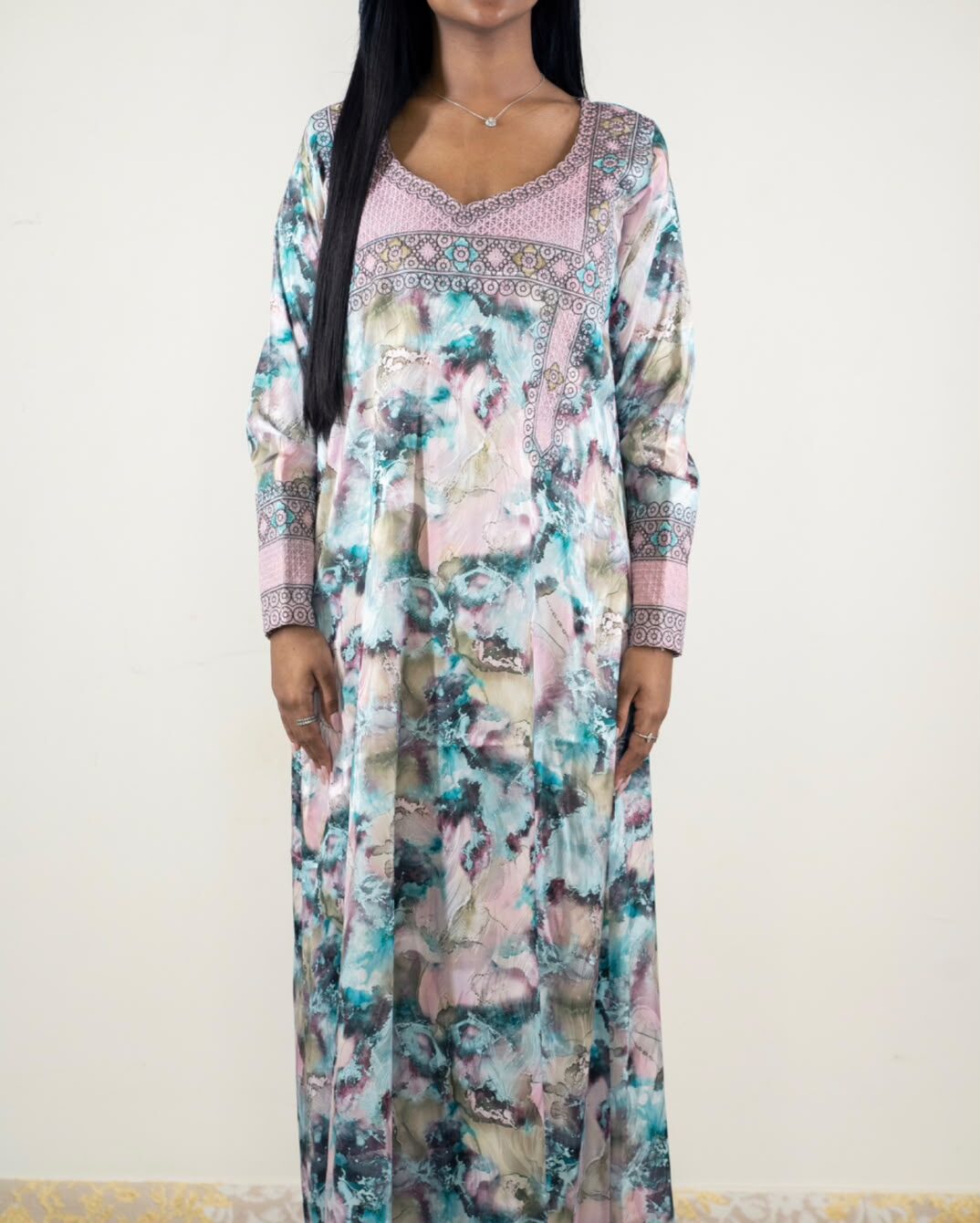 Pastel pink and turquoise abstract unstitched Jacquard Mukhawar with patterned neckline and cuffs